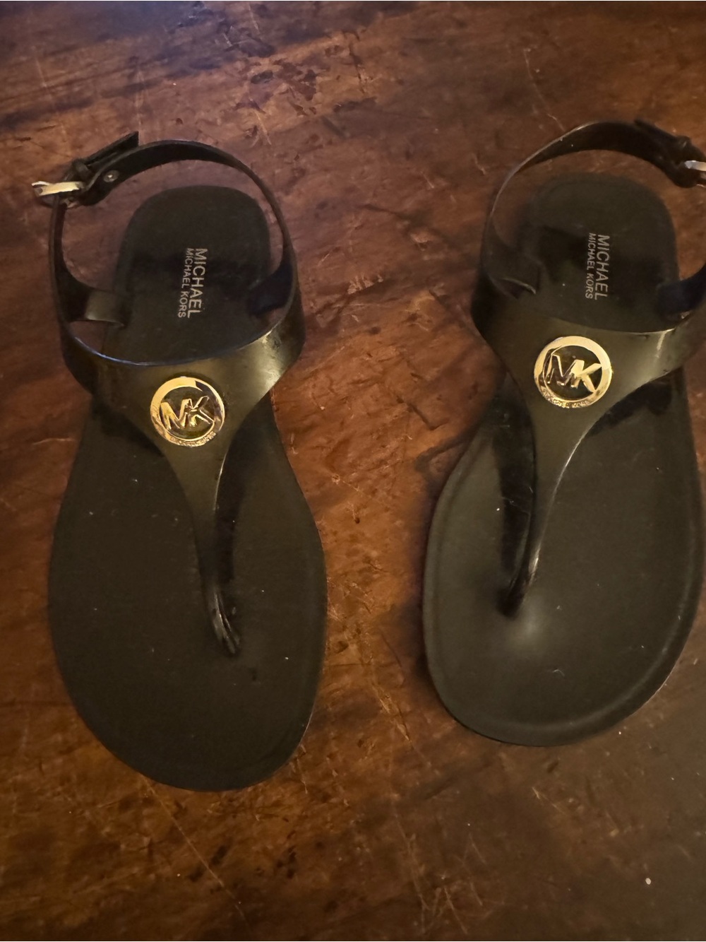 Michael Kors Black Thong Sandals with Gold MK Emblem